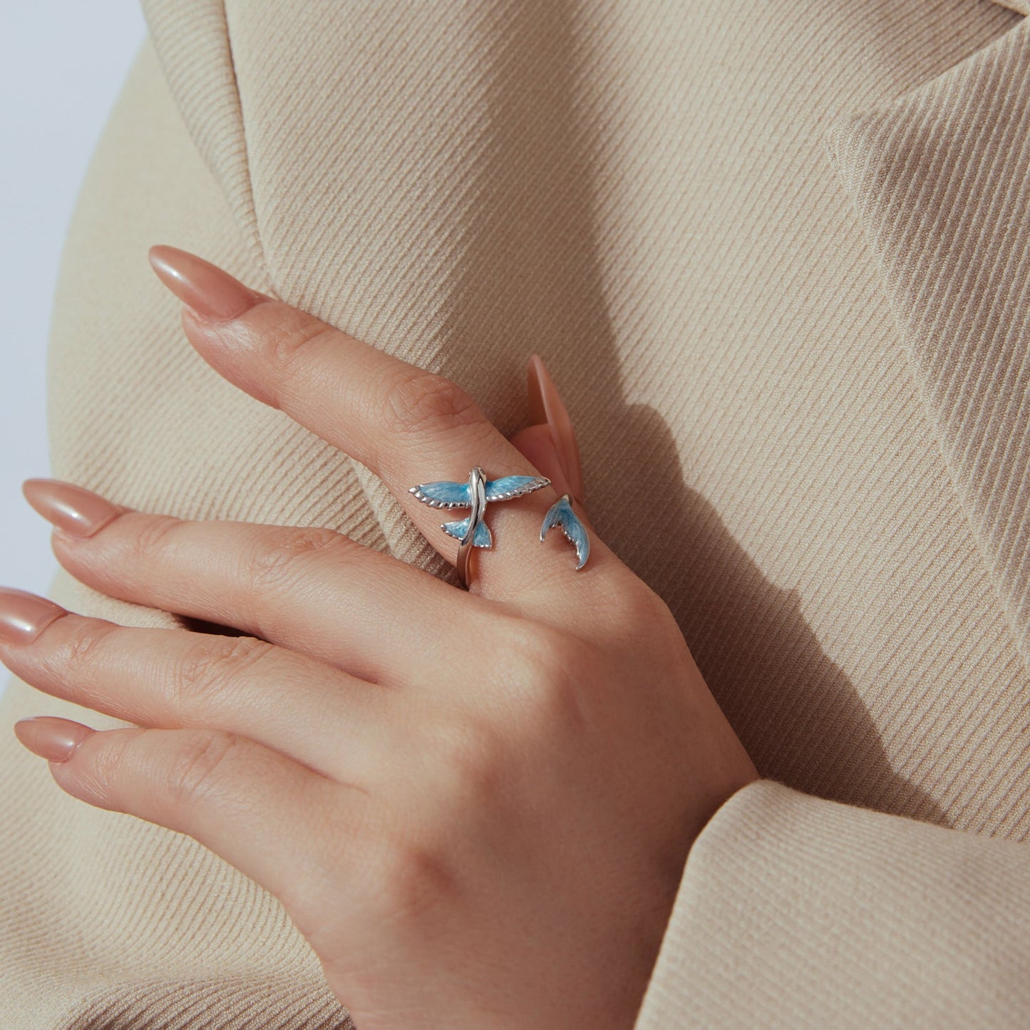 Ring 925 sterling silver with blue enamel leaf accents and pavé CZ stones on finger on Tampa Home & Garden Store