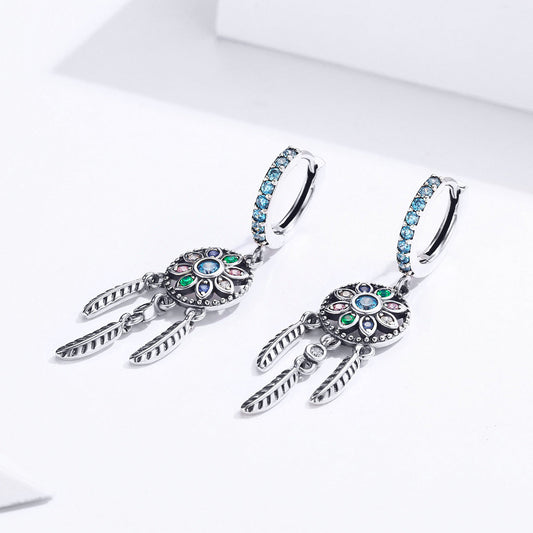 Oxidized sterling silver pavé CZ hoop earrings with blue stones and feather charms, 4x1 cm on Tampa Home & Garden Store
