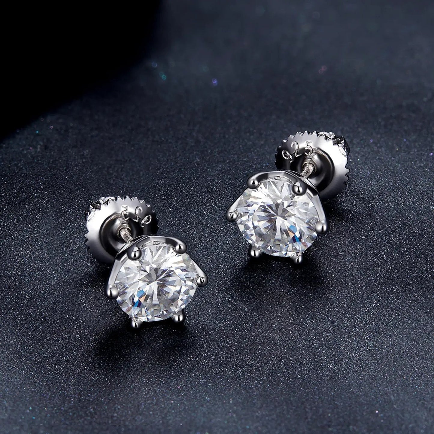 Pair of 925 sterling silver moissanite earrings by Bids.com with round stones in prong settings on Tampa Home & Garden Store