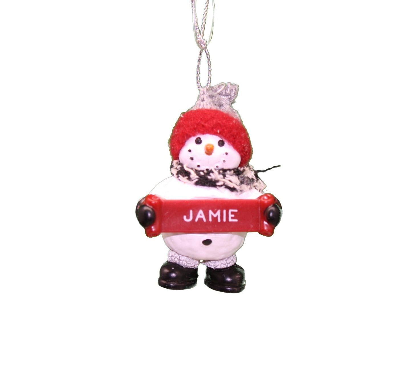 Cozy Snowman Ornament hanging, red knit hat, white body, black boots, holding red JAMIE sign on Tampa Home & Garden Store