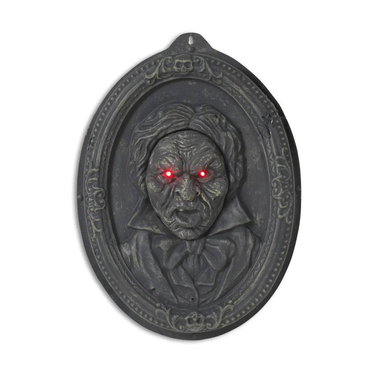 Haunted vintage portrait plaque with oval dark gray carved frame and glowing red eyes on Tampa Home & Garden Store