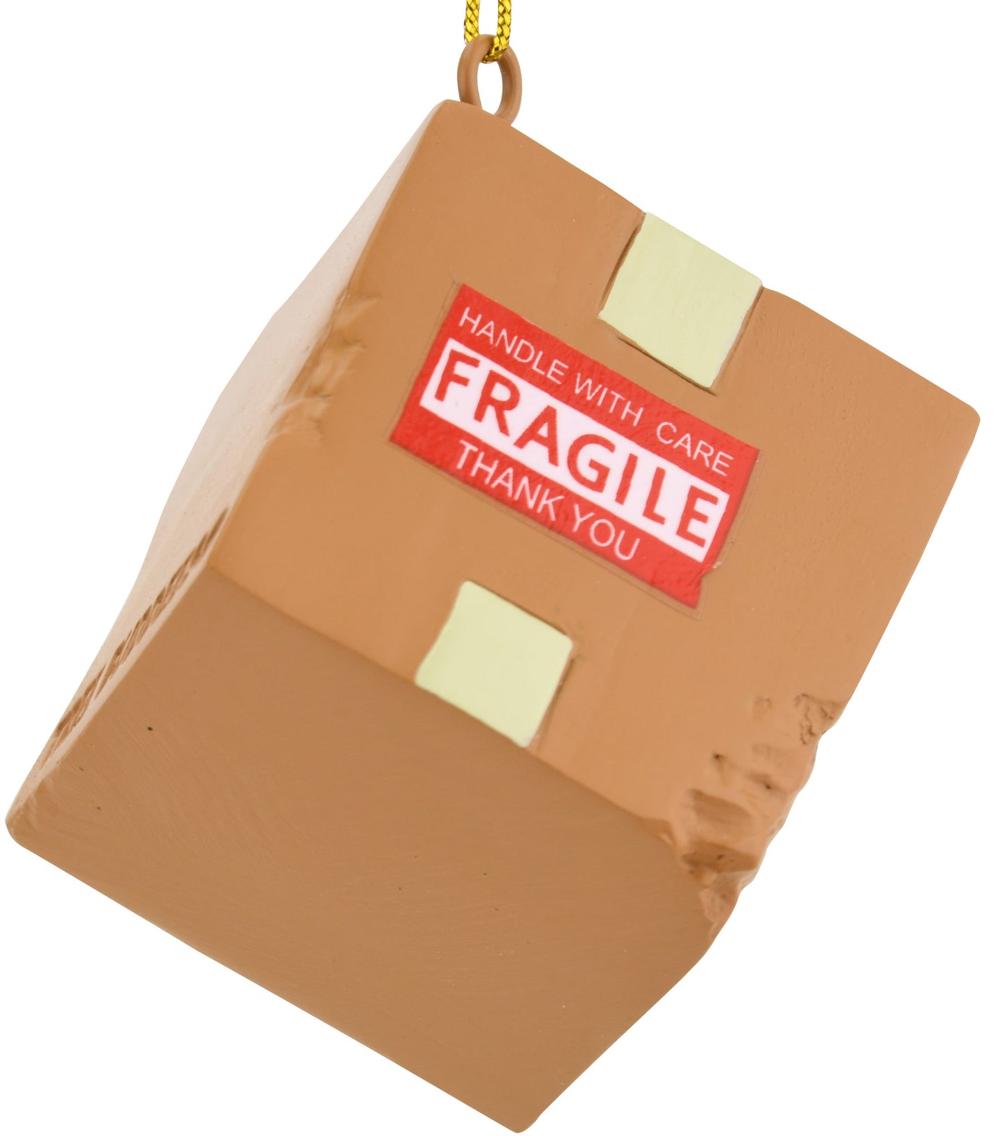 Damaged delivery package ornament with tan brown box, red FRAGILE label, gold hanging cord on Tampa Home & Garden Store