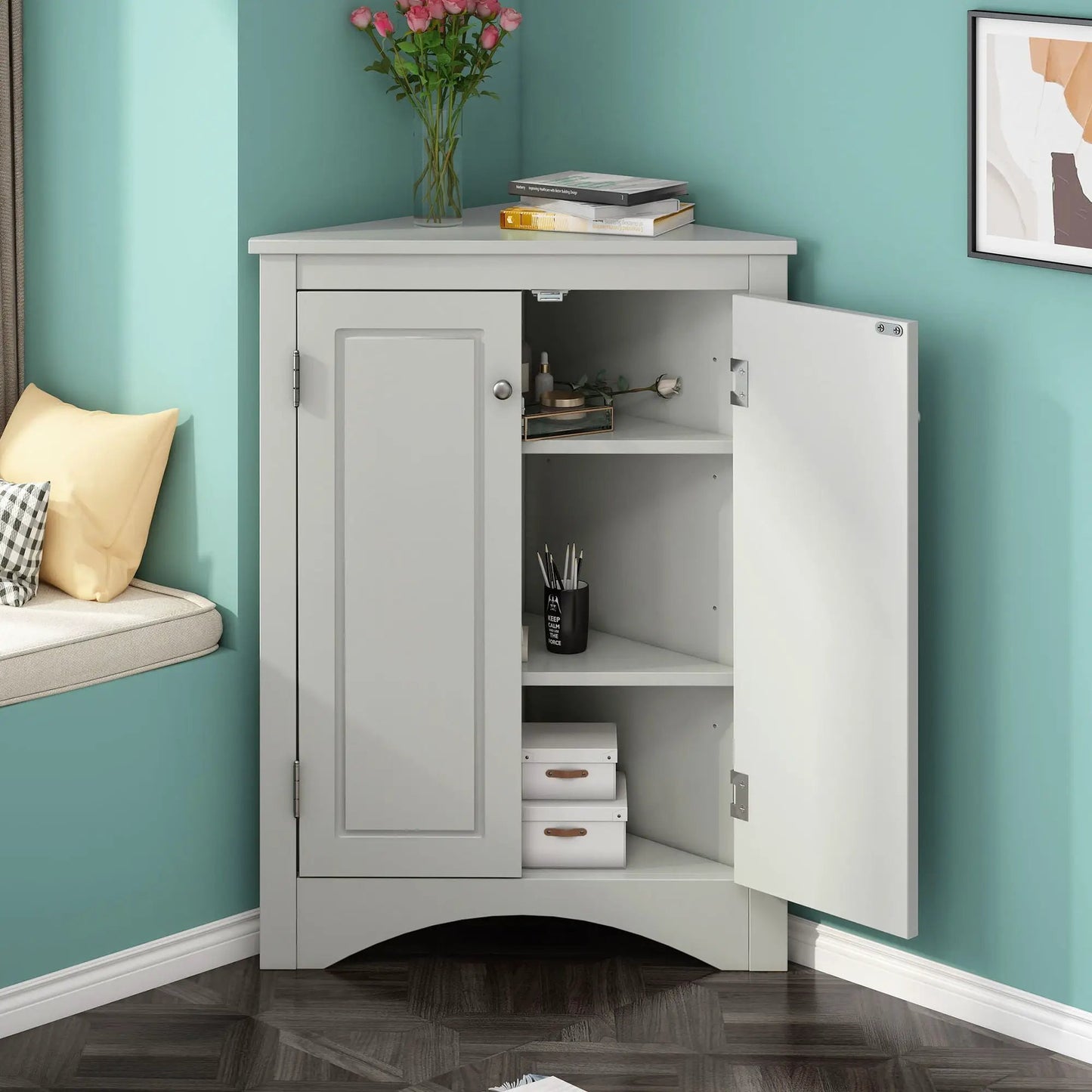 Triangle bathroom storage cabinet with adjustable shelves, gray linen cabinet topped pink roses on Tampa Home & Garden Store