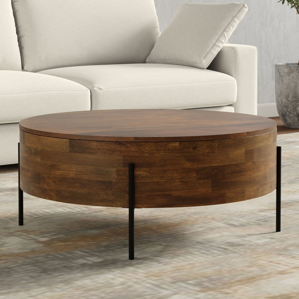 Stylish solid mango wood coffee table by HouseOfZazla with round top and dark finish on Tampa Home & Garden Store