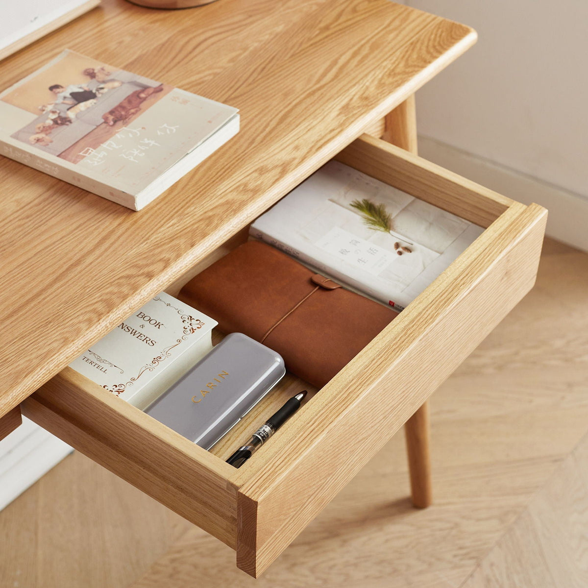 Oak computer desk with drawer in natural wood by HouseOfZazla, open drawer with notebooks on Tampa Home & Garden Store