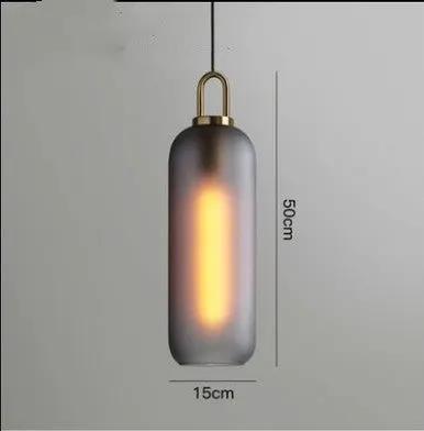 Decorbites Nordic Glass Ball Chandelier with frosted glass and brass accent, amber glow on Tampa Home & Garden Store