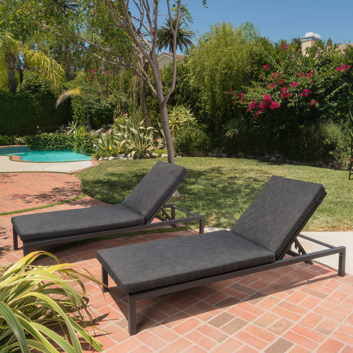 Modern chaise lounges with dark gray water-resistant cushions on metal frame 3-pack on Tampa Home & Garden Store