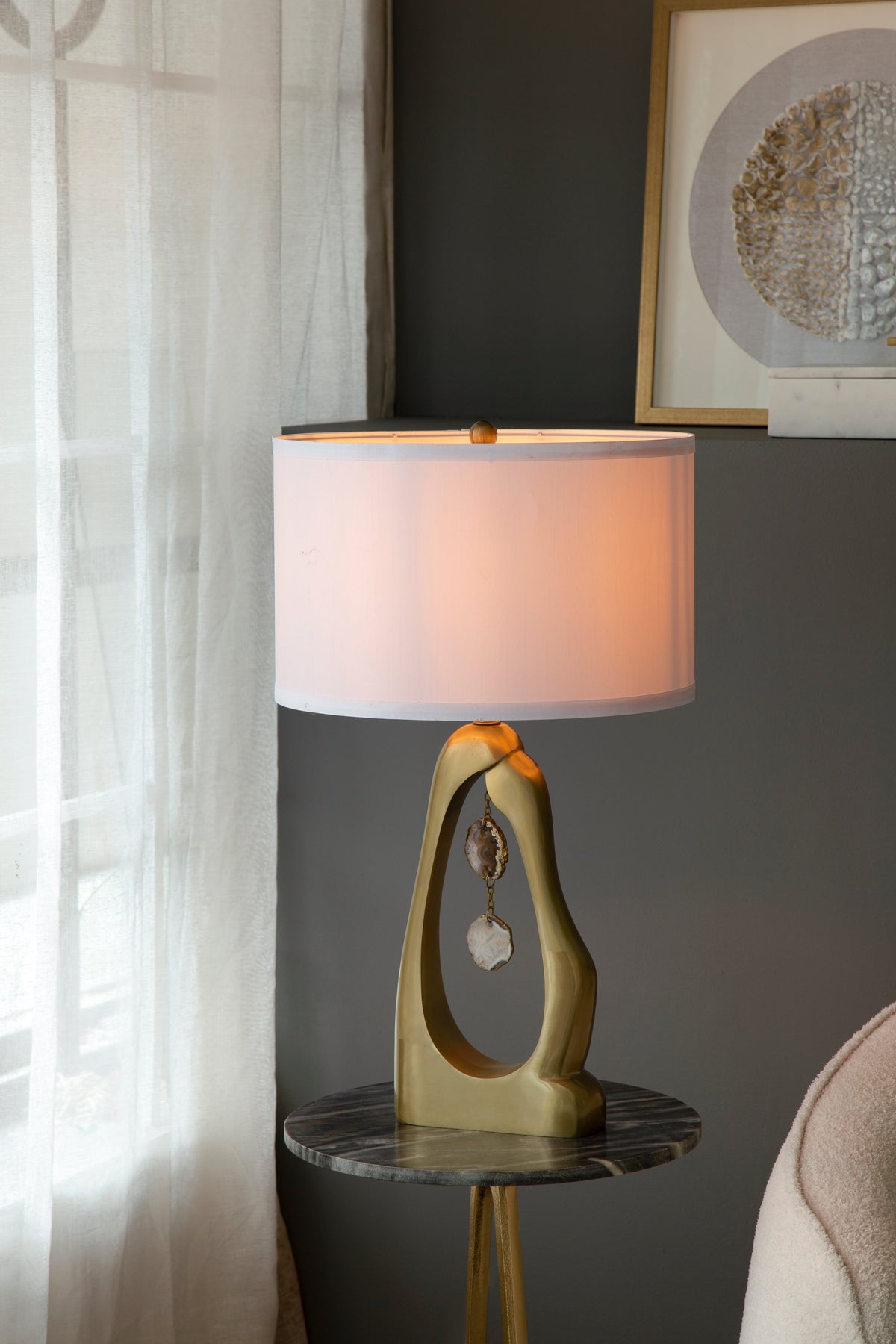 Geode-Inspired Gold Aluminum Table Lamp with pink shade and sculptural base on Tampa Home & Garden Store