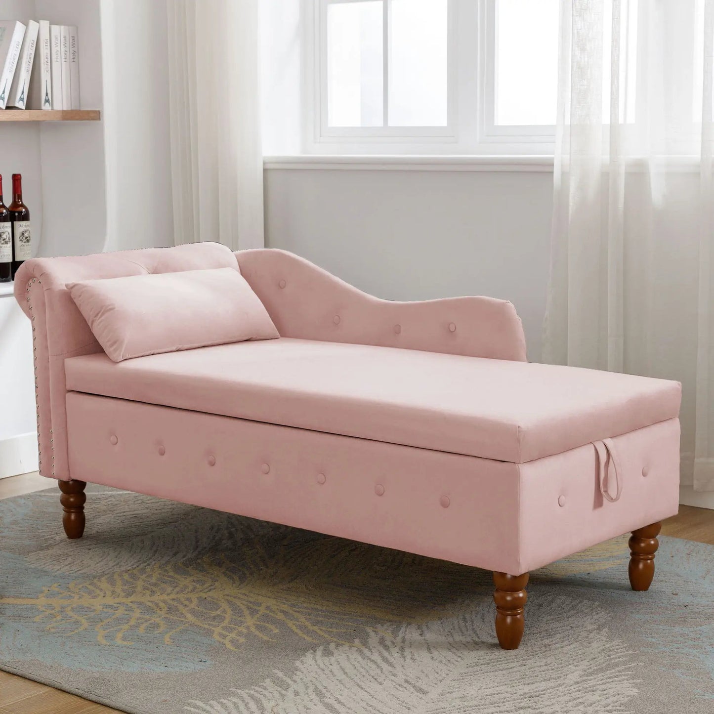 Pink upholstered chaise lounge with nailhead trim and storage base in bedroom setting on Tampa Home & Garden Store