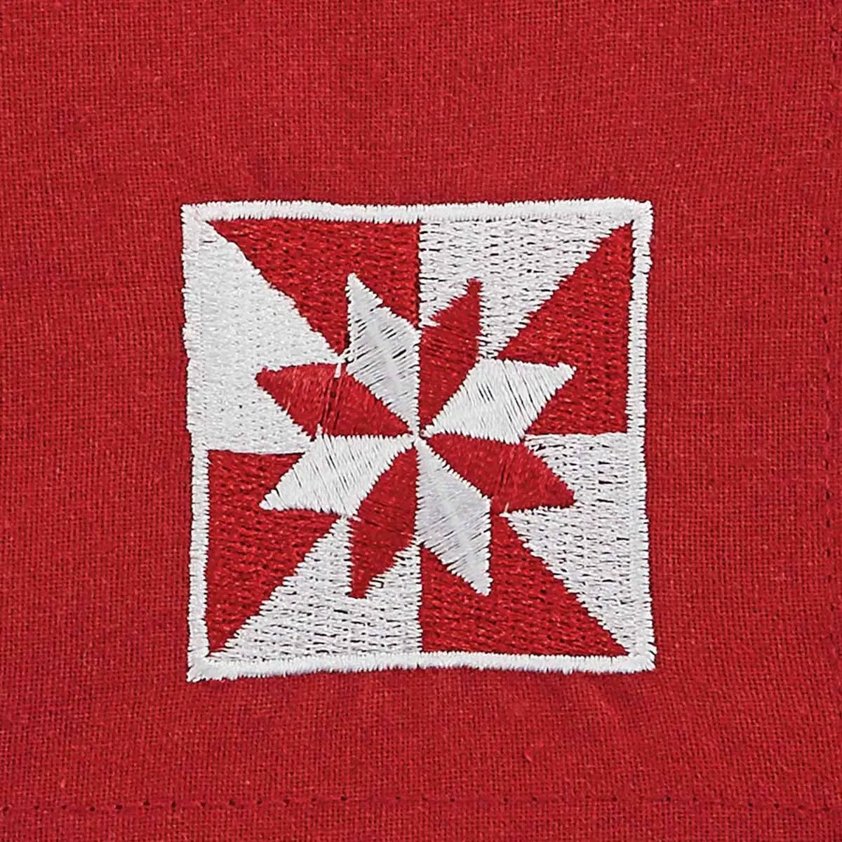 Napkin Williamsburg Heritage Star embroidery on red linen with white star patch on Tampa Home & Garden Store
