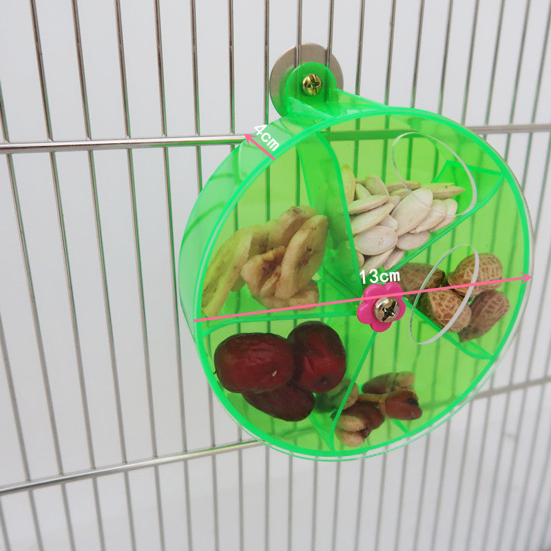 Parrot Supplies acrylic foraging wind wheel bird toy in bright green with seeds and nuts on Tampa Home & Garden Store