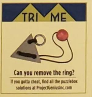 Puzzlebox Brainteaser Tri Me Gift Box mechanical puzzle with gray triangle, ring and red bead on Tampa Home & Garden Store