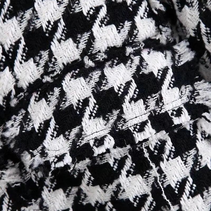 Stevvex tweed coat fabric in black and white houndstooth close-up on Tampa Home & Garden Store