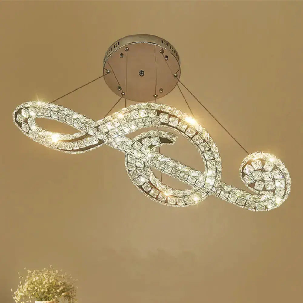 Elegant crystal musical note pendant light with looped crystal band by Decorbites on Tampa Home & Garden Store