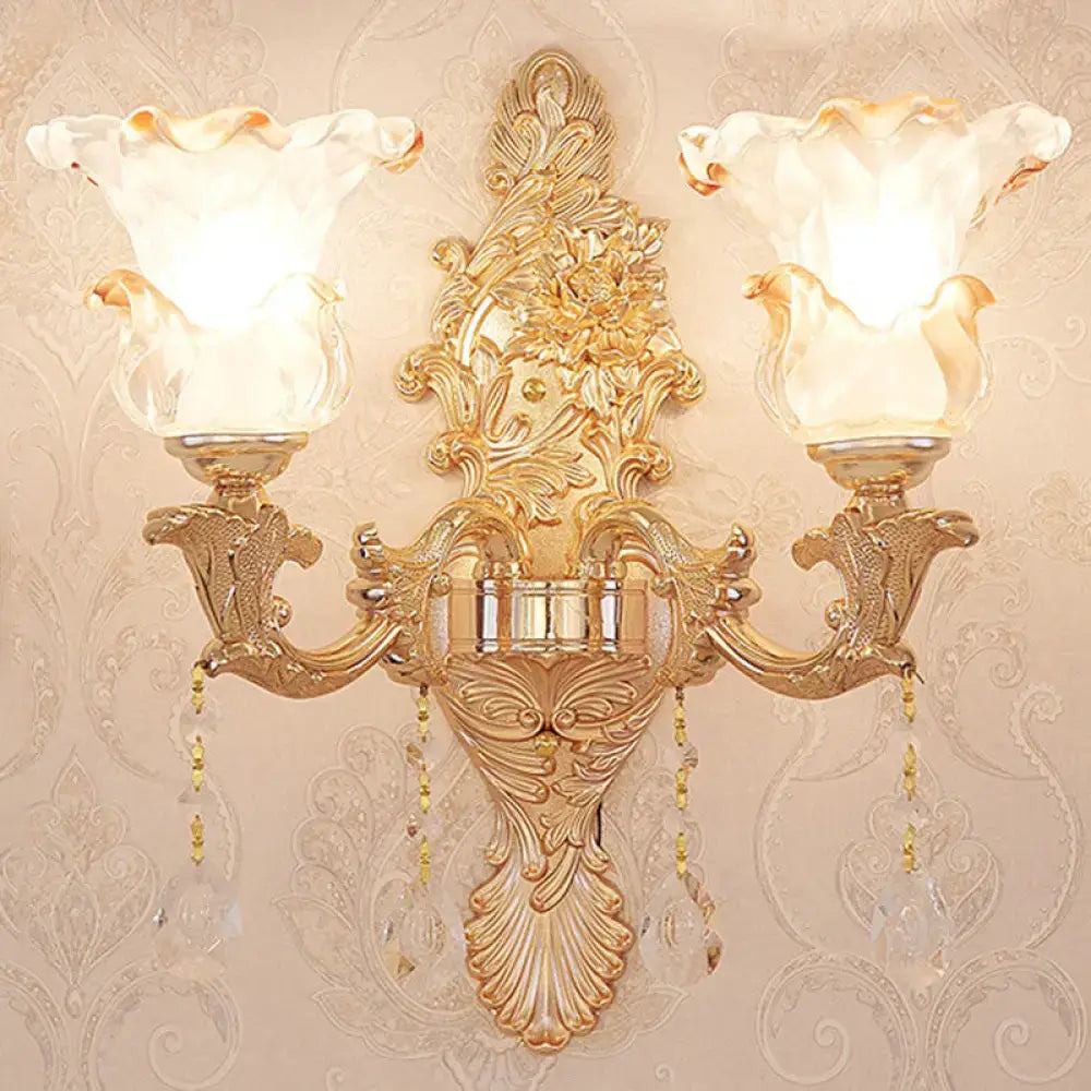 Elegant gold two-arm scroll wall sconce with crystal drops and ruffled glass shades Decorbites on Tampa Home & Garden Store
