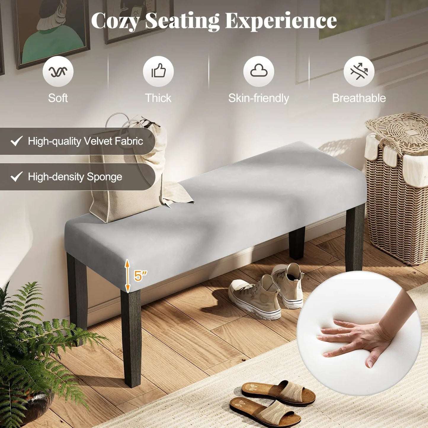 End of bed bench with padded gray velvet seat and dark wood legs in a bedroom on Tampa Home & Garden Store