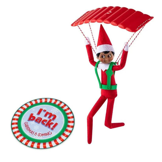 Scout Elf from Glide and Go Set with red parachute, green harness, and I'm back badge on Tampa Home & Garden Store