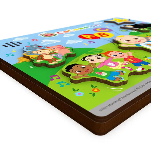 Cocomelon wooden sound puzzle for kids with cartoon figures on a layered wooden puzzle board on Tampa Home & Garden Store