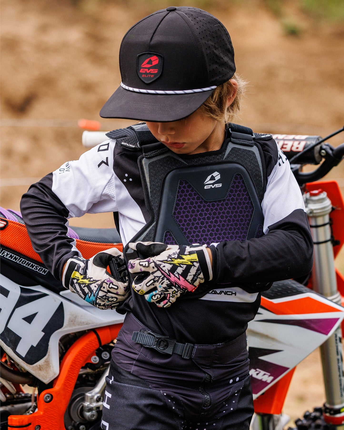 EVS Sports Evolution Youth Chest Protector on black motocross chest armor worn by youngster on Tampa Home & Garden Store