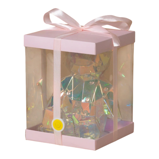 Lighted holographic bear in a pink gift box with satin ribbon; iridescent interior visible on Tampa Home & Garden Store