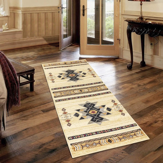 Tribes GC_YLS4006 Southwest Area Rug cream with black and tan geometric motifs on wood floor on Tampa Home & Garden Store