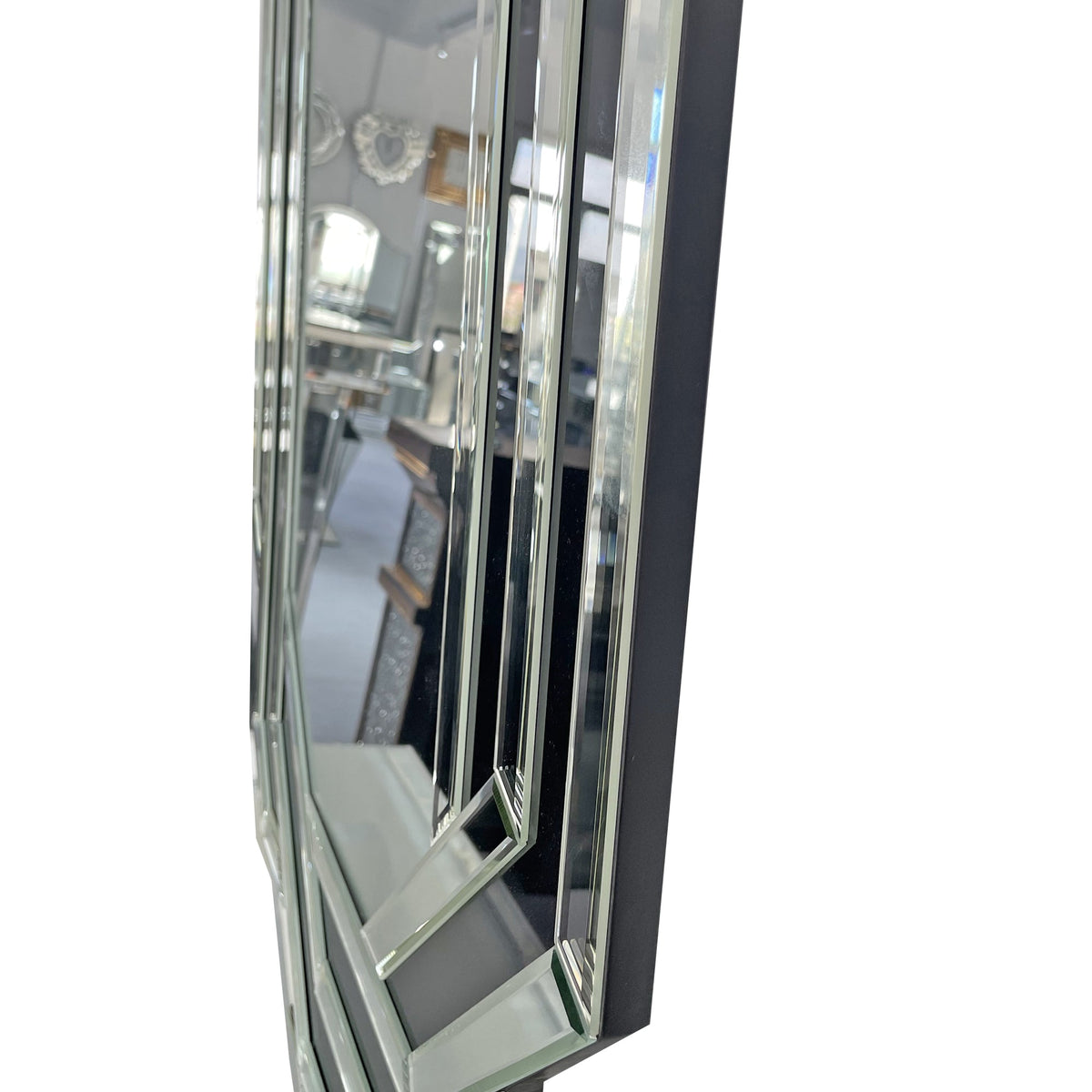 Modern decorative wall mirror with black frame and beveled chrome trim for bathroom vanity on Tampa Home & Garden Store