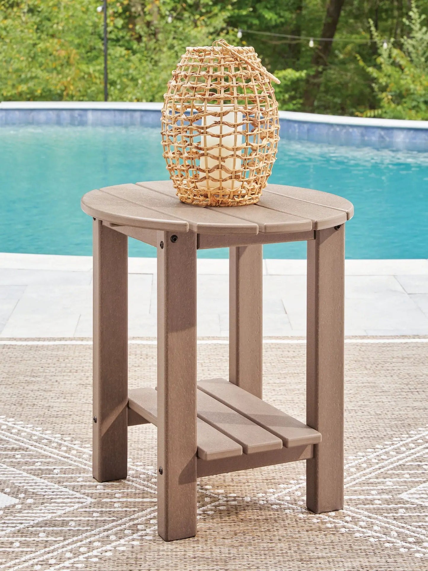 Grover Beach Oval Table coffee table in brown wood with woven wicker lantern on Tampa Home & Garden Store