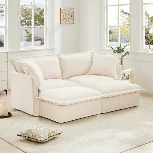 HouseOfZazla slipcovered 2-seater sofa with 2 ottomans in beige fabric, bright living room on Tampa Home & Garden Store