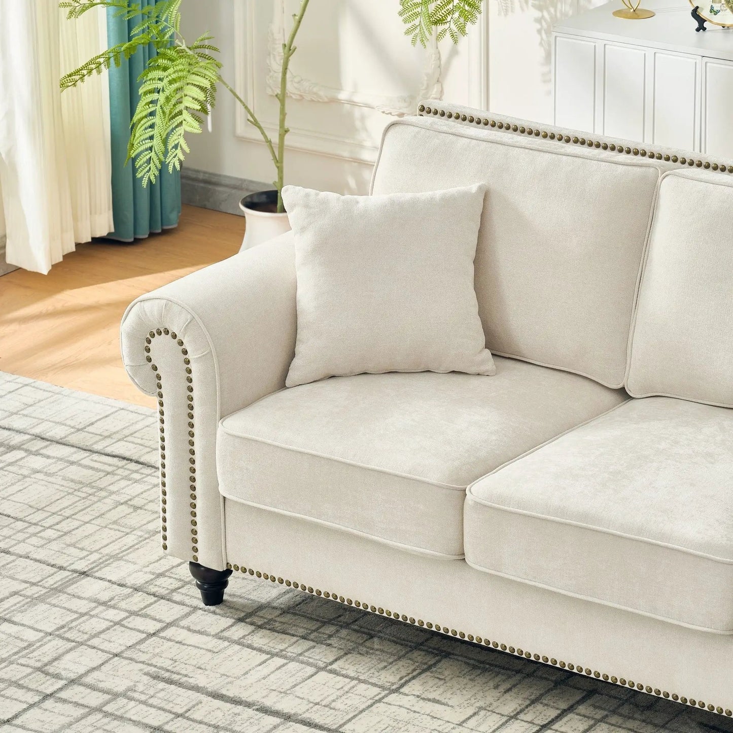 2 Seater sofa with rolled arms in beige fabric, nailhead trim on Tampa Home & Garden Store