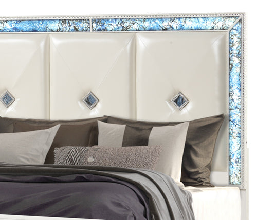 Laguna queen upholstered bed by HouseOfZazla; tufted headboard with blue marble mirrored trim on Tampa Home & Garden Store