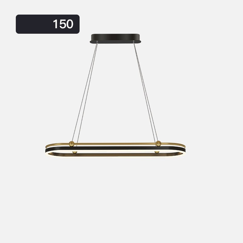 Modern dining room chandelier with gold rings suspended by cables from a canopy Decorbites on Tampa Home & Garden Store