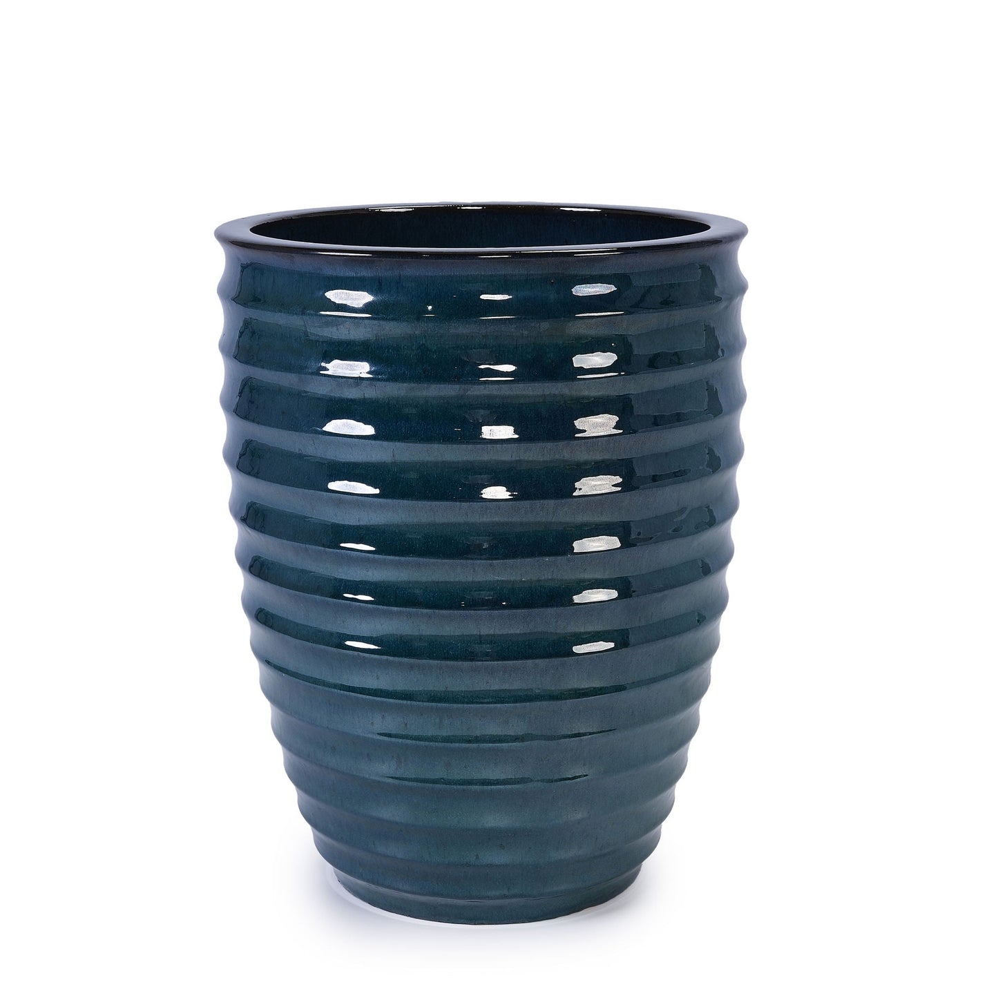 Flowerpot planter by HouseOfZazla in glossy dark blue ceramic with ribbed, wavy texture on Tampa Home & Garden Store