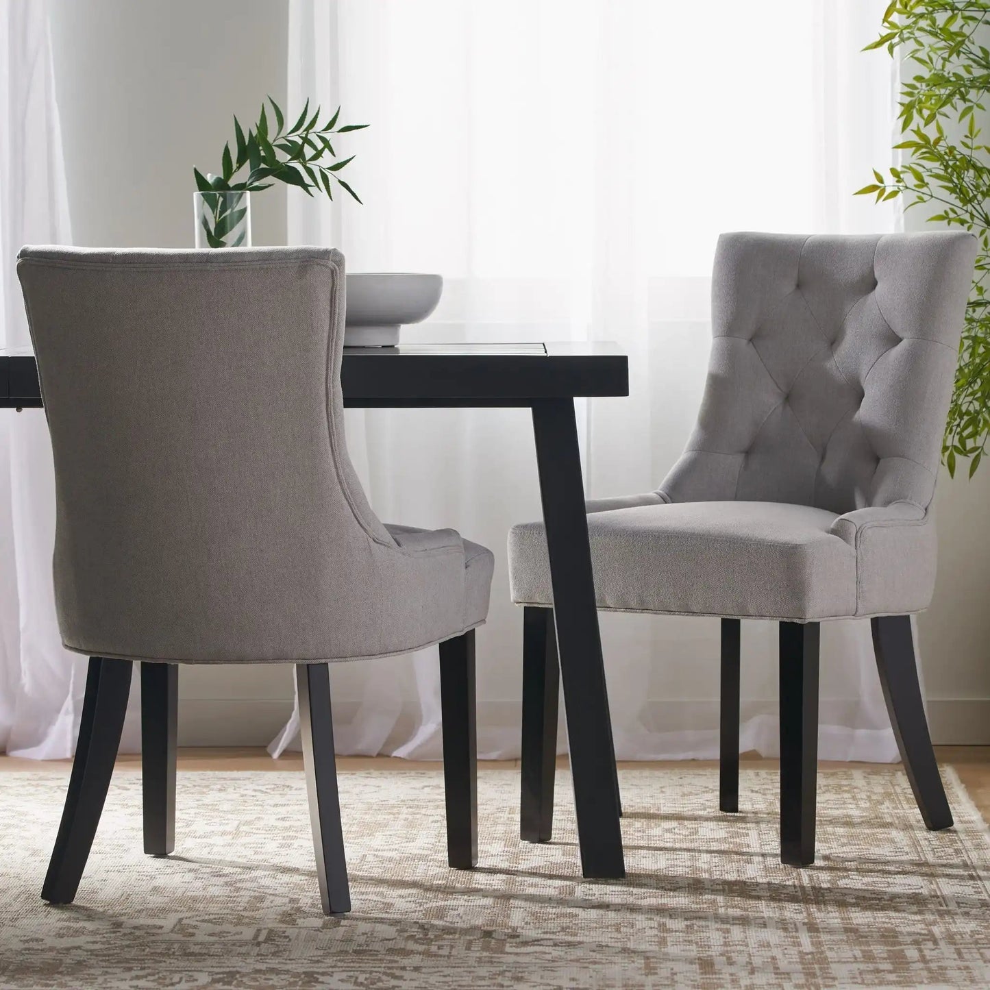 Contemporary Cheney dining chair set in tufted gray fabric with black legs by HouseOfZazla on Tampa Home & Garden Store
