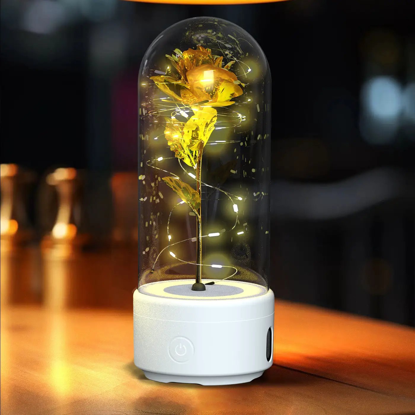 Rose LED light and Bluetooth speaker 2-in-1 with golden rose inside glass dome and warm LEDs on Tampa Home & Garden Store