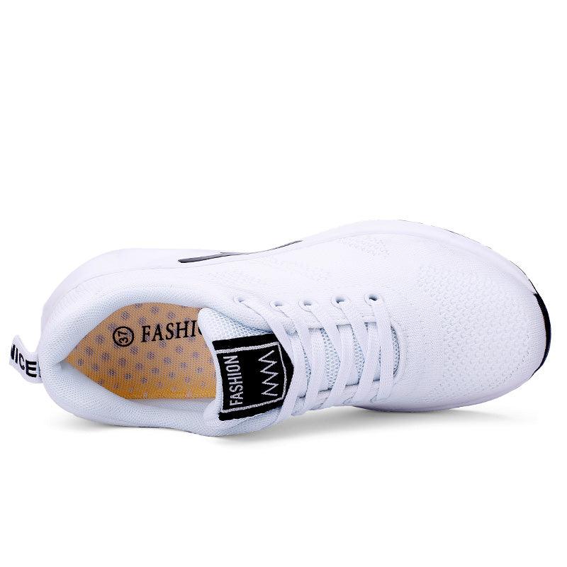 Stevvex white women's athletic sneakers with mesh upper, lace-up, cushioned air sole top view on Tampa Home & Garden Store