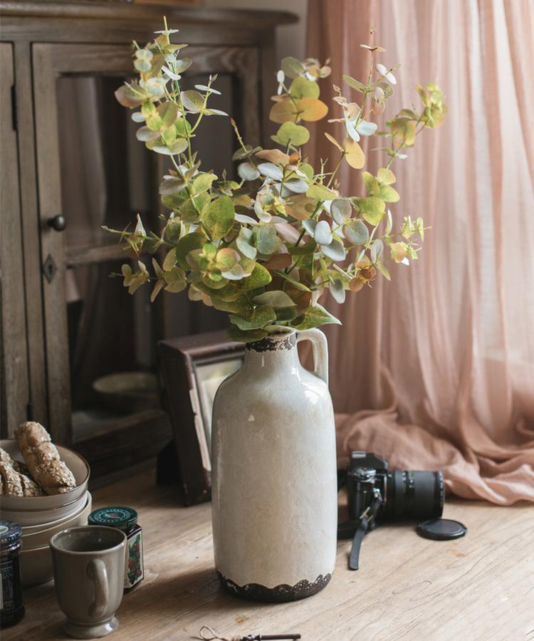 Faux Leaf Autumn Eucalyptus Stem RusticReach in ceramic pitcher with green leaves on Tampa Home & Garden Store