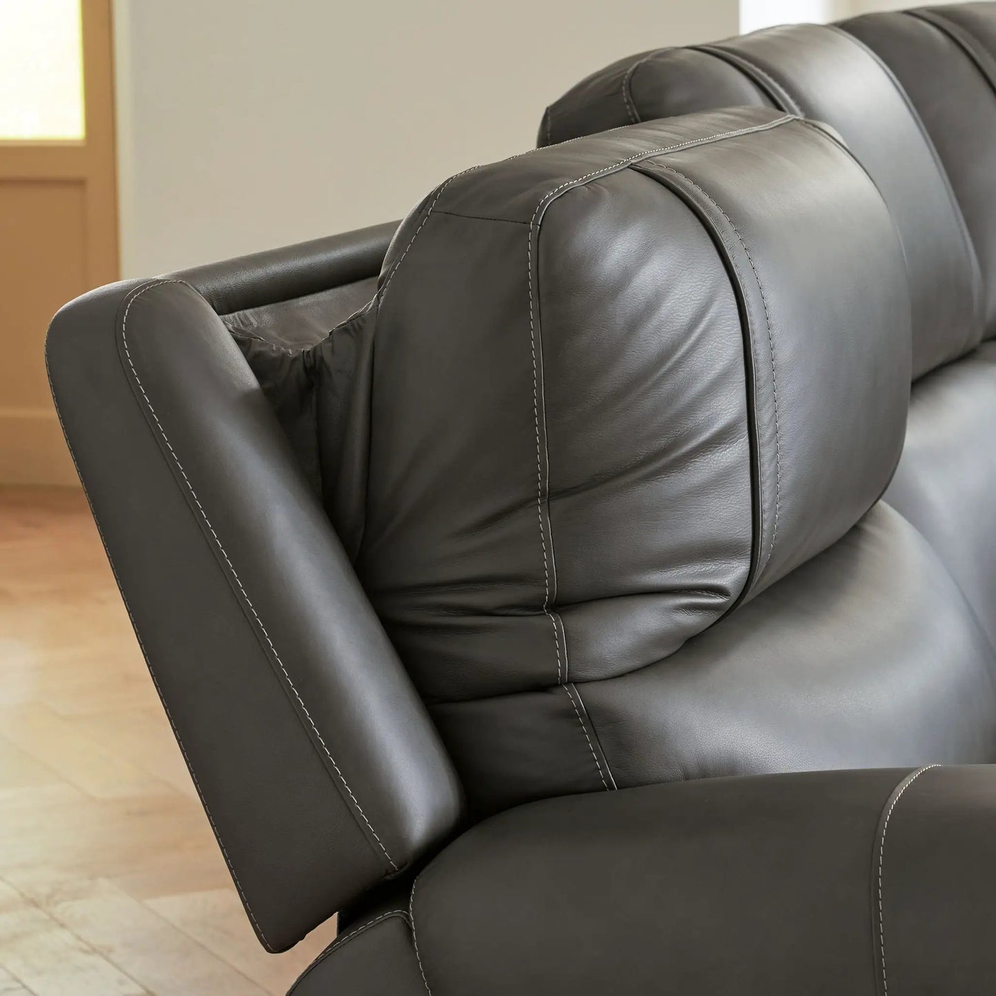 5Z Pittson power reclining sectional in black leather with white stitching by Unique Piece Furniture on Tampa Home & Garden Store