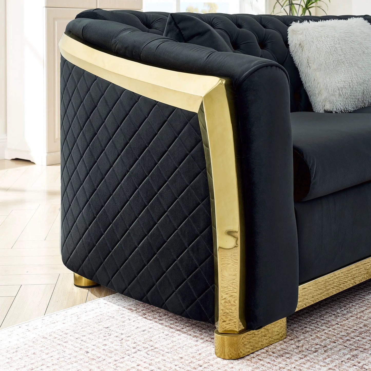 L-shaped Chesterfield sectional with black velvet and gold-tone frame on Tampa Home & Garden Store