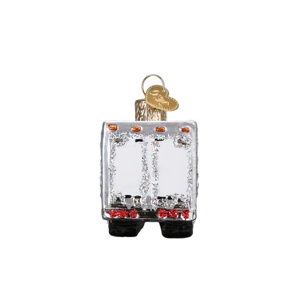 Old World Christmas semi truck ornament, silver glitter body, orange lights on Tampa Home & Garden Store