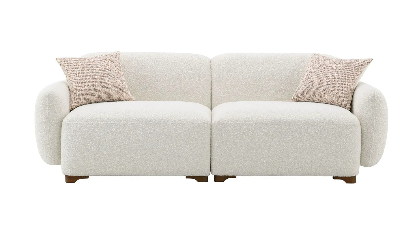 Darius Boucle Sofa beige with 2 peach toss pillows, by Unique Piece Furniture on Tampa Home & Garden Store