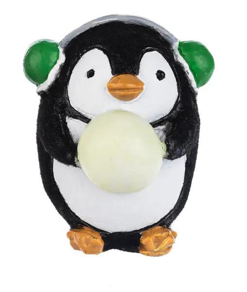 Christmas penguin pocket charm figurine with orange beak and feet, holding a pale yellow ball on Tampa Home & Garden Store