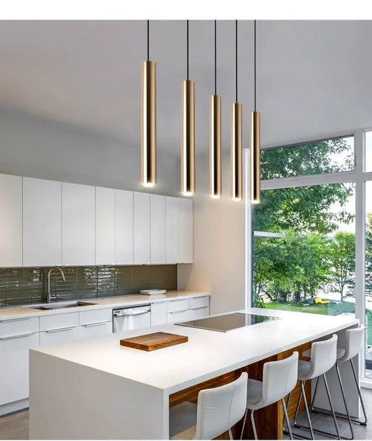 French Gold long cylindrical pendant chandelier by Decorbites, five tubes over island on Tampa Home & Garden Store