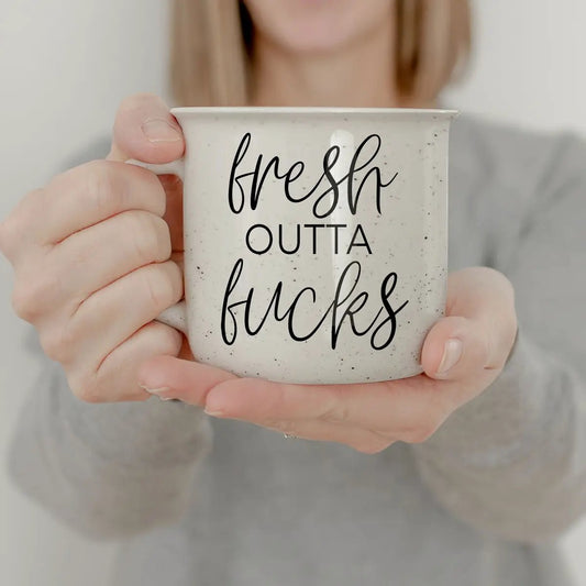 Gia Roma speckled white ceramic coffee mug with black script fresh outta bucks on Tampa Home & Garden Store