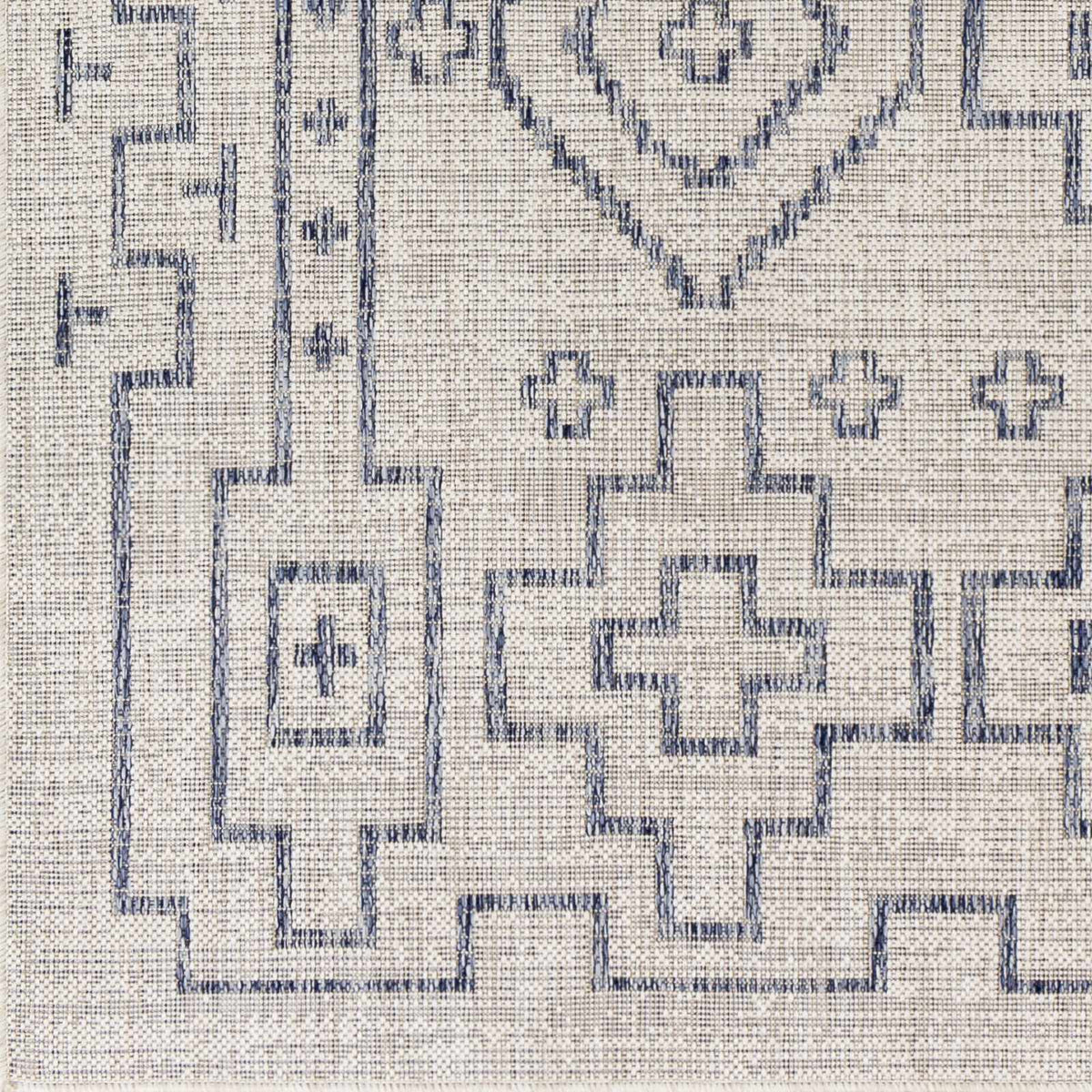 Fernway Indoor & Outdoor Rug by Boutique Rugs, blue geometric border on light beige background on Tampa Home & Garden Store