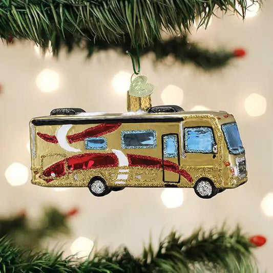 Class A motorhome glass ornament in gold with blue windows and red-white accents on Tampa Home & Garden Store