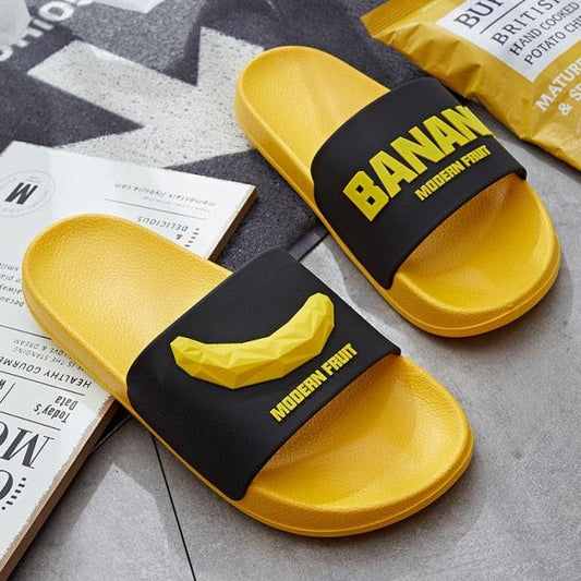 Women Fruit Slides pair yellow sole with black elastic strap banana graphic MODERN FRUIT brand ST85SH0231SEA Stevvex sandals on Tampa Home & Garden Store