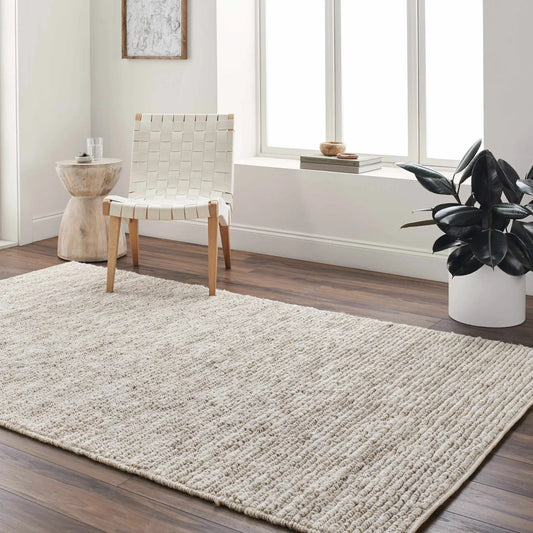Glover Bleached Braided Jute Carpet beige braided rug Boutique Rugs on Tampa Home & Garden Store