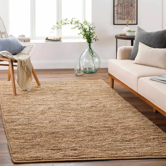 Glover Natural Braided Jute Rug by Boutique Rugs in natural beige braided texture on Tampa Home & Garden Store
