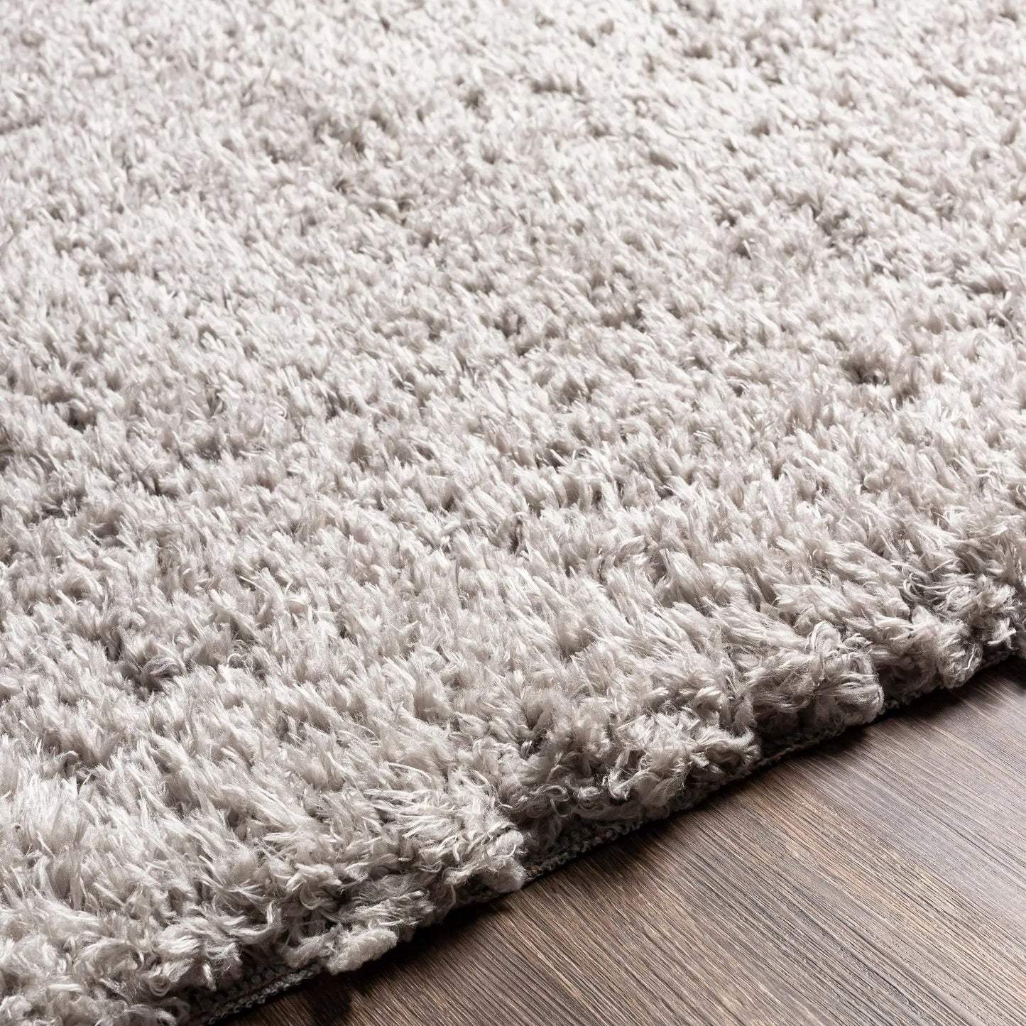 Siari Solid Medium Gray Shag Rug by Boutique Rugs with plush shag texture on Tampa Home & Garden Store
