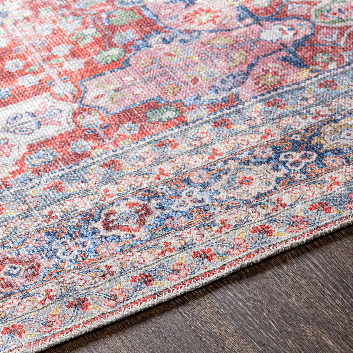 Rust Goma Vintage Area Rug red blue distressed floral pattern Boutique Rugs on Tampa Home & Garden Store